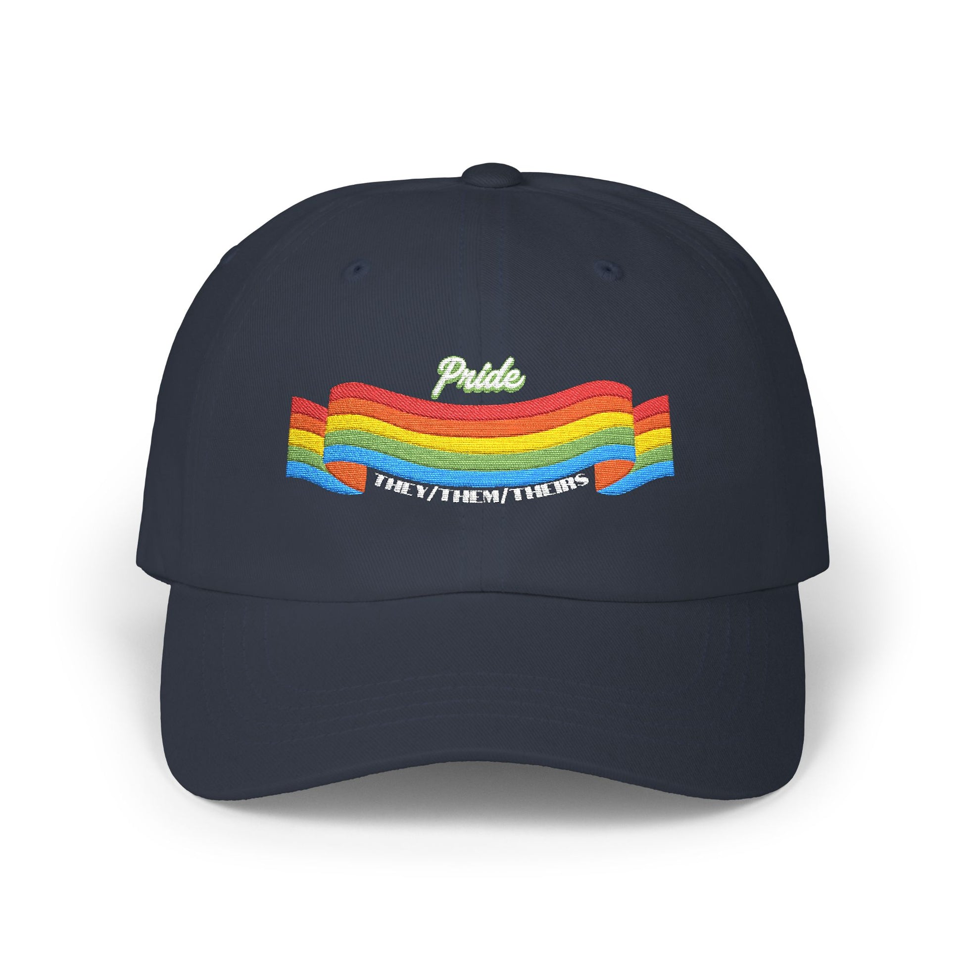 A navy blue cap from the Worldwide PRIDE store, featuring a rainbow design and the embroidered pronouns they/them/theirs.
