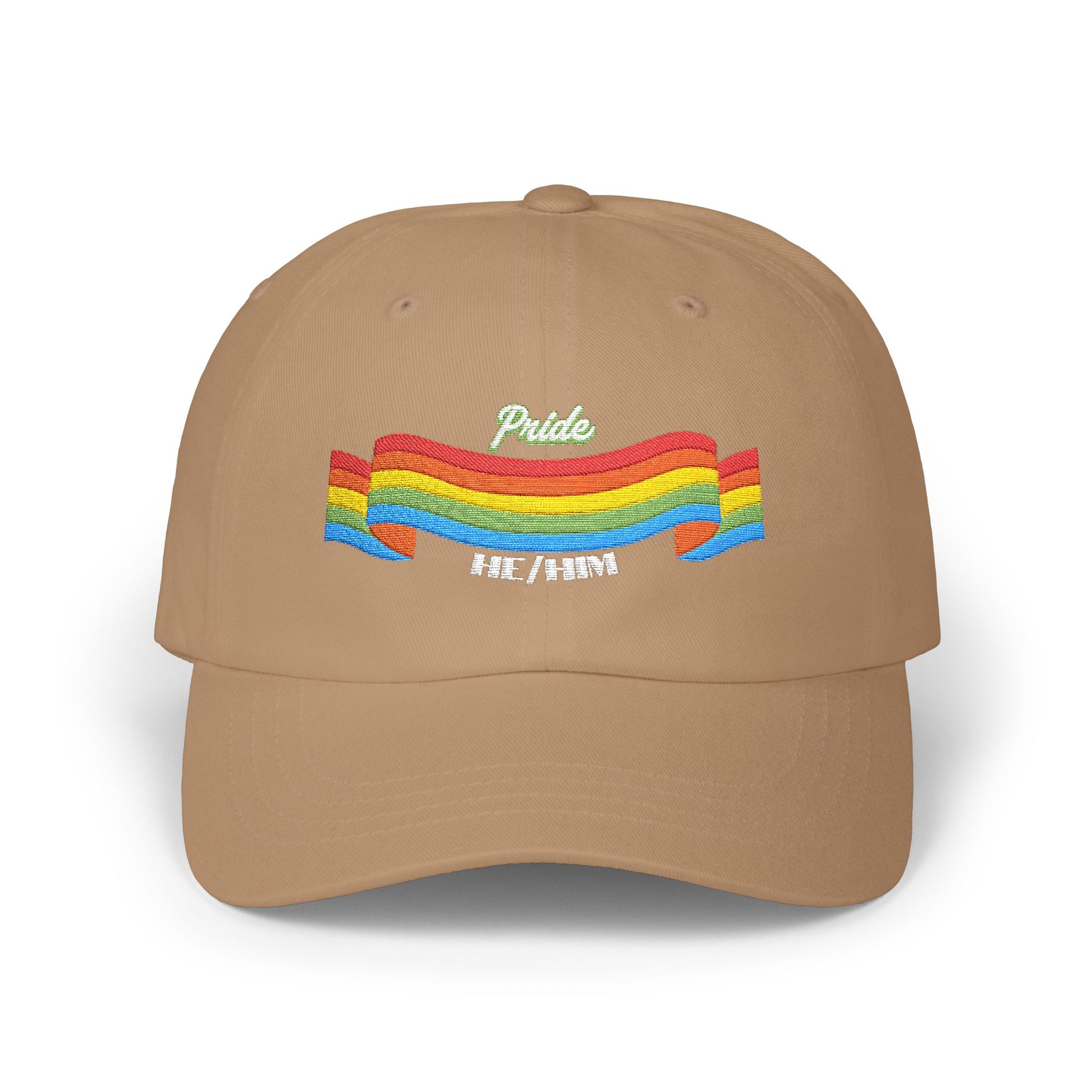 A khaki cap from the Worldwide PRIDE store, featuring a rainbow design and the embroidered pronouns he/him.