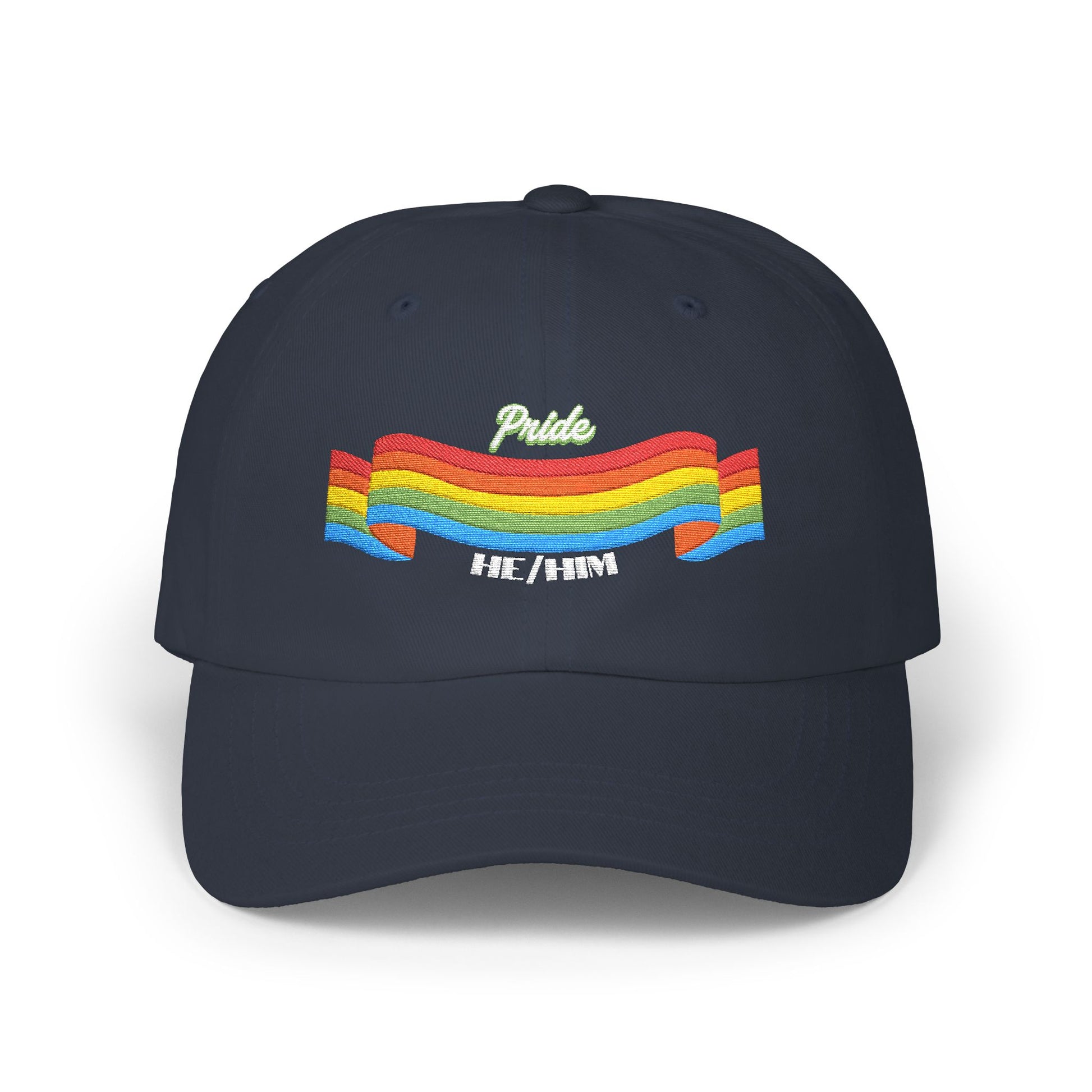 A navy blue cap from the Worldwide PRIDE store, featuring a rainbow design and the embroidered pronouns he/him.