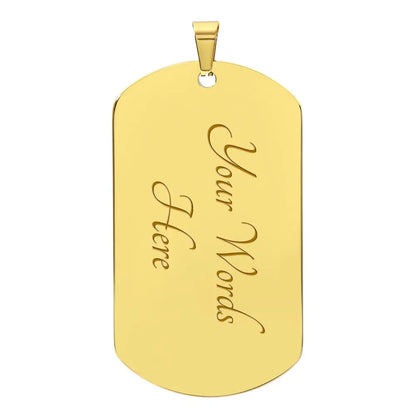 The back of a gold metal dog tag pendant. This side is customizable with your engraved name. The front image celebtates the LGBTQ community.