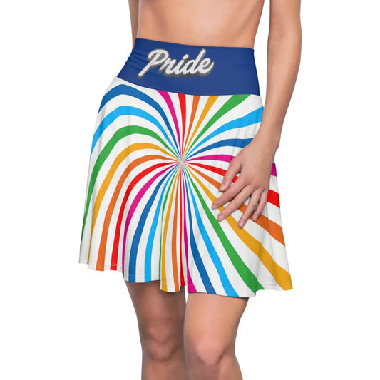 A person is wearing a colorful skirt with a spiral of rainbow stripes converging at the center, celebrating worldwide PRIDE. The blue waistband features Pride in white script, representing the LGBTQ community, as their hand rests elegantly on the side.