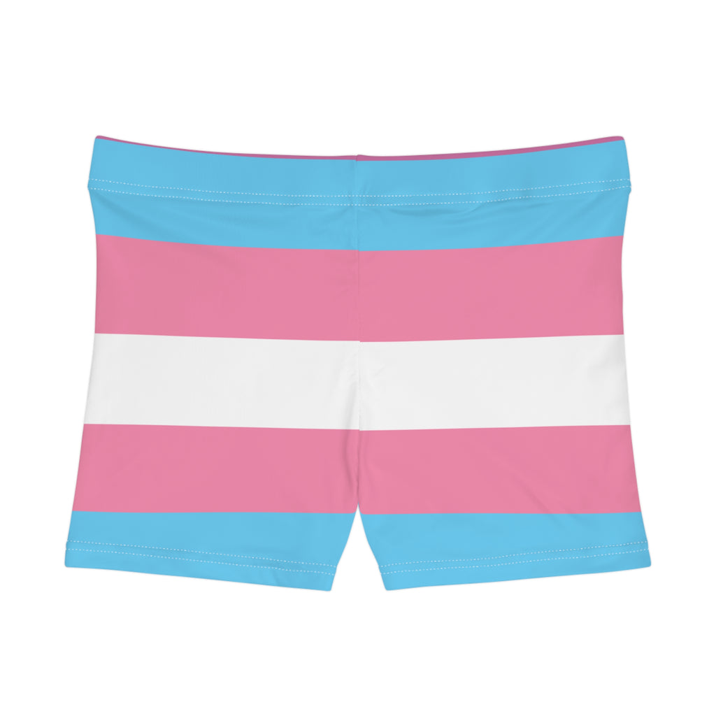 A photo of colorful shorts with pink, blue, and white horizontal stripes echoes the design of the transsexual flag.