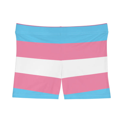 A photo of colorful shorts with pink, blue, and white horizontal stripes echoes the design of the transsexual flag.