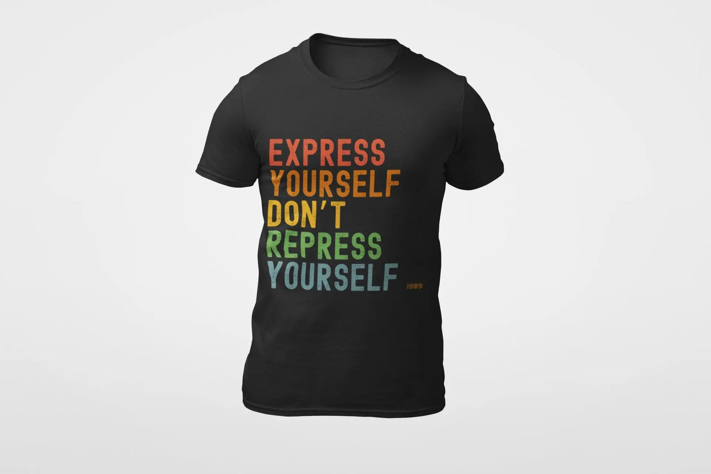 A black unisex t-shirt with the text 'EXPRESS YOURSELF DON'T REPRESS YOURSELF' in multicolored letters on the front.