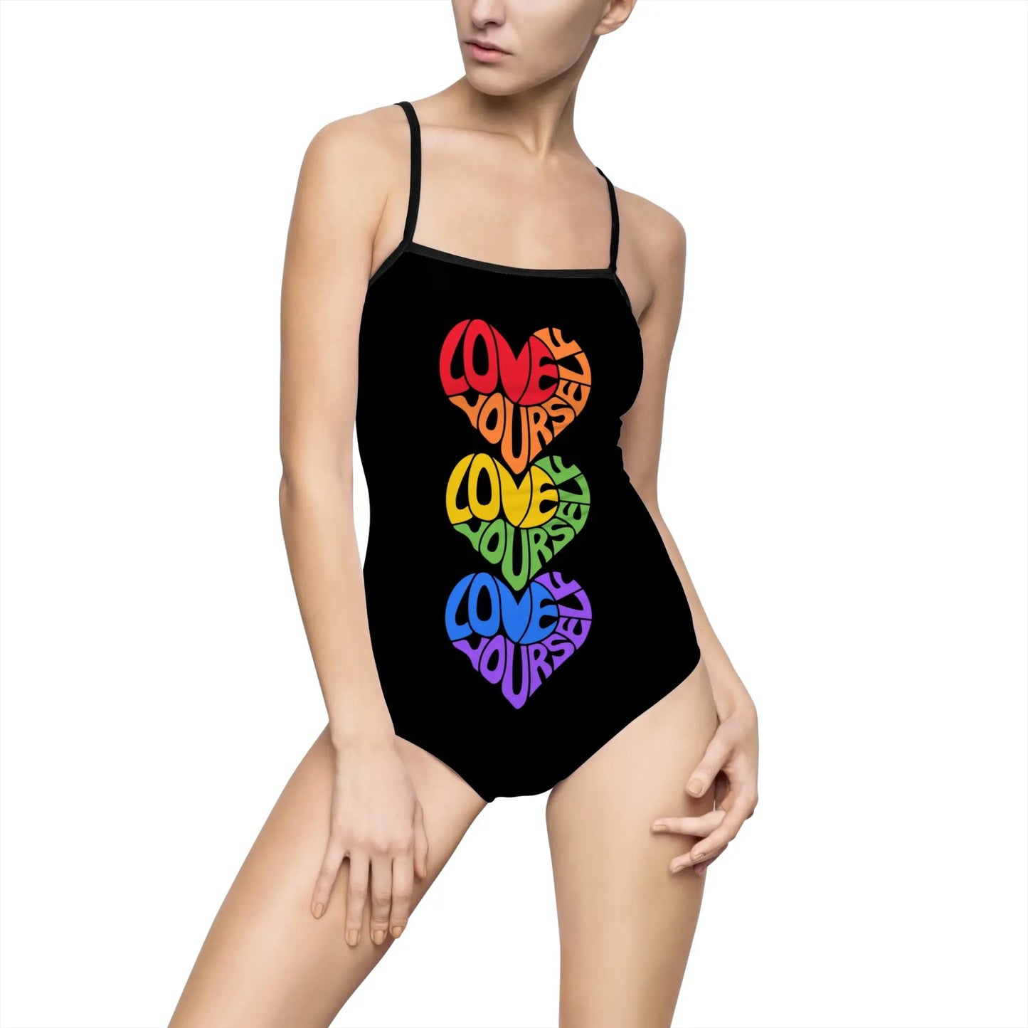 A person dons a black one-piece swimsuit featuring the vibrant message LOVE YOURSELF in heart shapes, symbolizing Worldwide PRIDE. The plain white background accentuates the colorful celebration of self-love and unity within the LGBTQ community.