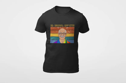 A black unisex short-sleeve t-shirt with a graphic print of a person's face and the text 'ORIGINAL GAY-STER' in rainbow-colored letters.