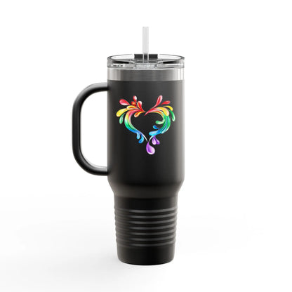 A black travel mug with a handle and straw, showcasing a colorful heart made of water splashes. The Worldwide PRIDE cup is celebrating diversity and love.