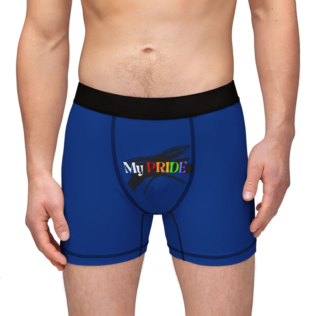 A person wearing blue boxer briefs with a black waistband, proudly showcasing My PRIDE in colorful letters on the front and and JOY on the back. This vibrant design celebrates the worldwide PRIDE and spirit of the LGBTQ community.