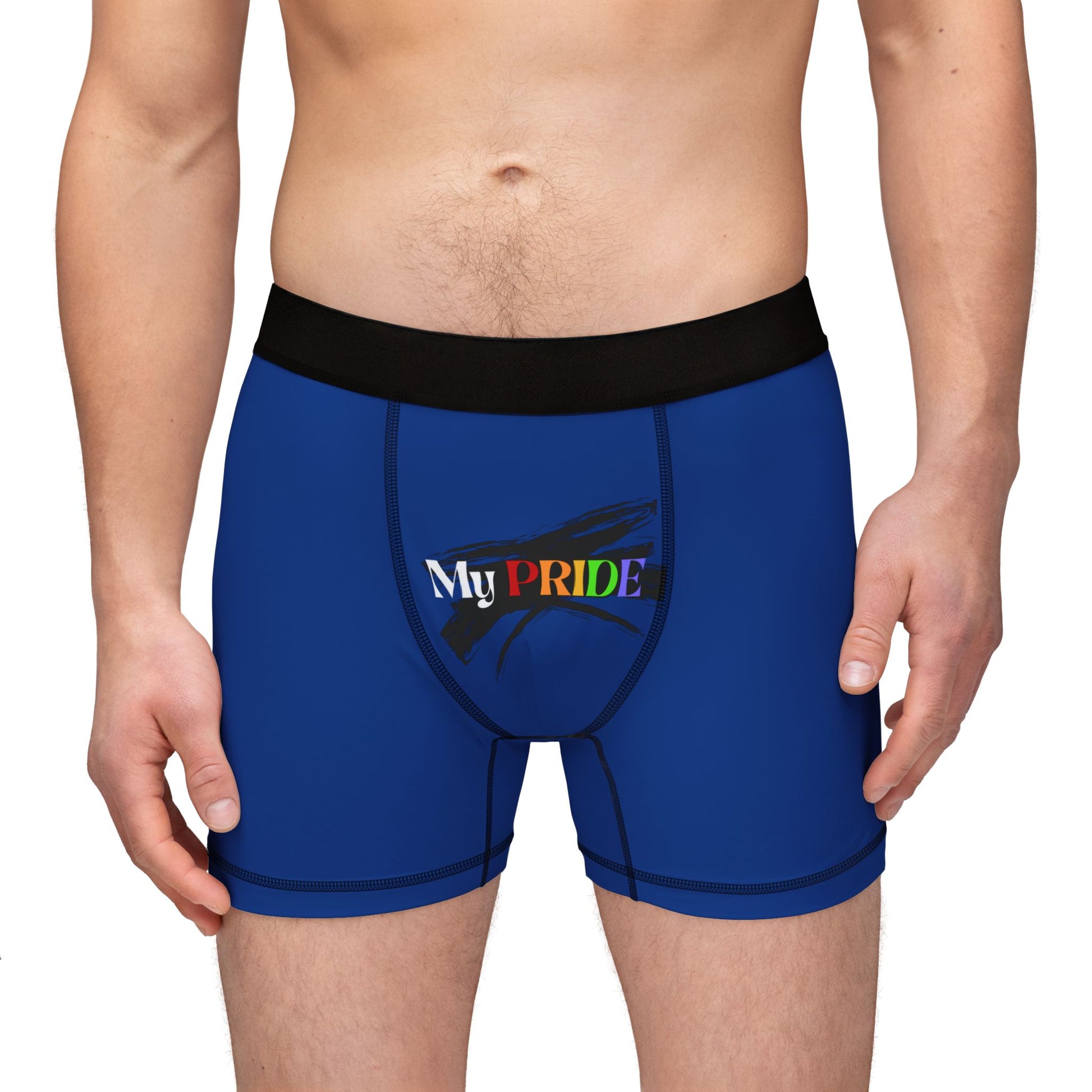 A person wearing blue boxer briefs with a black waistband, proudly showcasing My PRIDE in colorful letters on the front and and JOY on the back. This vibrant design celebrates the worldwide PRIDE and spirit of the LGBTQ community.