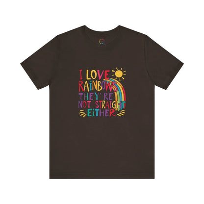 A brown unisex short-sleeve t-shirt with a colorful graphic that includes text saying "I love rainbows they're not straight either."