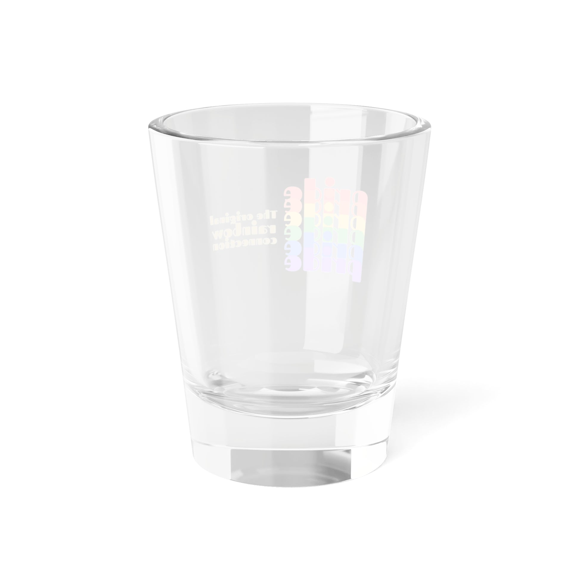 Back view of a shot glass features pride in a rainbow gradient on the left, celebrating the LGBTQ community. On the right, it reads The original rainbow connection in gold text. The glass, symbolizing worldwide PRIDE, sits empty against a white background.