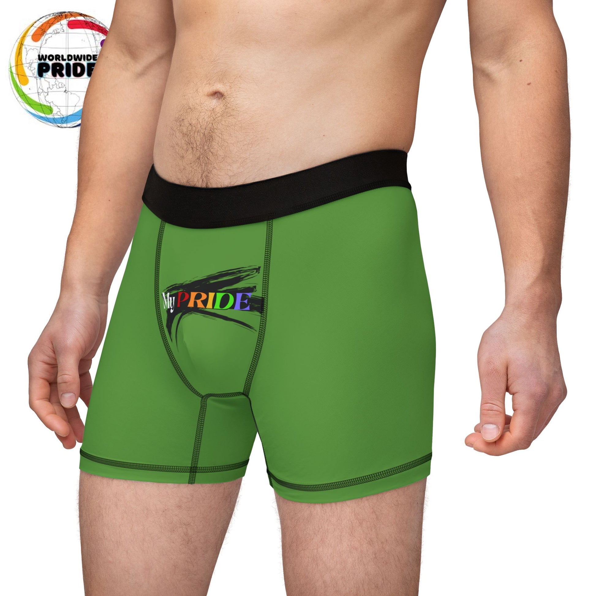 A person is wearing green boxer briefs featuring a black waistband. My PRIDE is boldly printed on the front, with PRIDE in vibrant rainbow colors, celebrating the worldwide PRIDE movement. The persons torso and upper thighs are visible, but their face remains unseen.