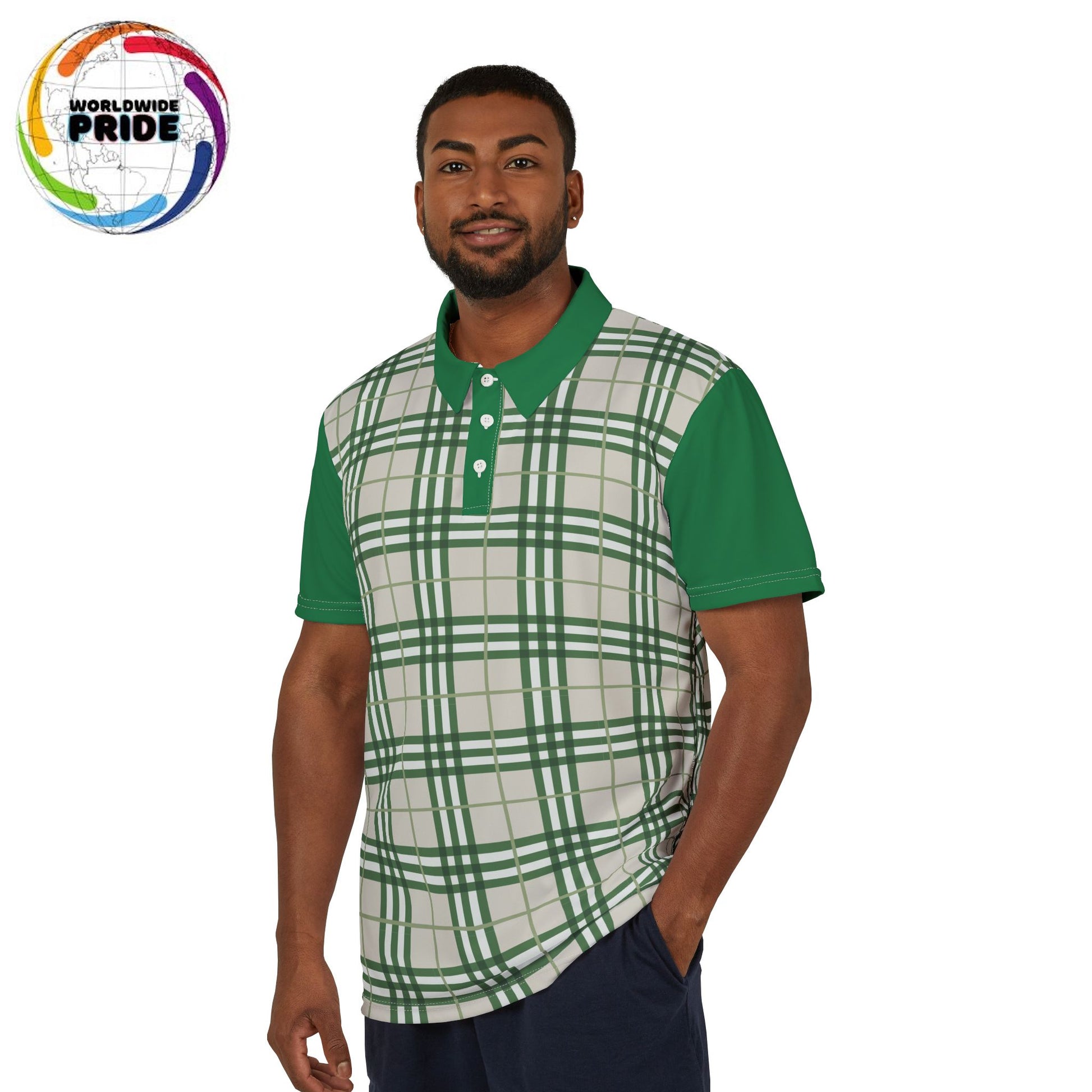 A person wearing a polo shirt showcasing a green "prideberry" plaid pattern on the front with solid green short sleeves. The shirt also features a collar and a small, colorful lion on the right sleeve, celebrating the LGBTQ community's vibrant spirit.