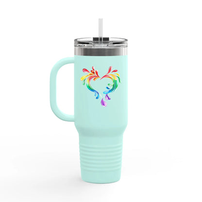 A light blue travel mug with a handle and straw, showcasing a colorful heart made of water splashes. The Worldwide PRIDE cup is for celebrating diversity and love.