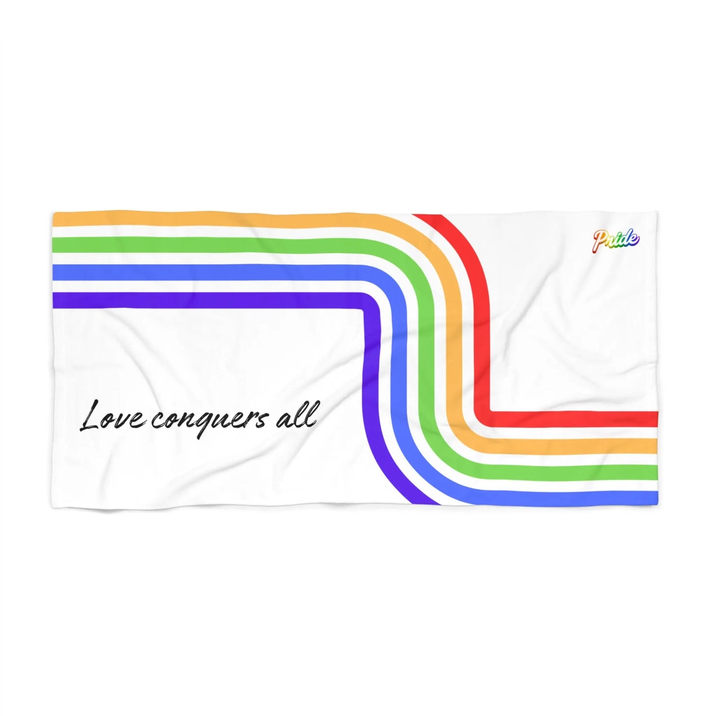 Towel with rainbow stripes and 'Love conquers all' text on a white background