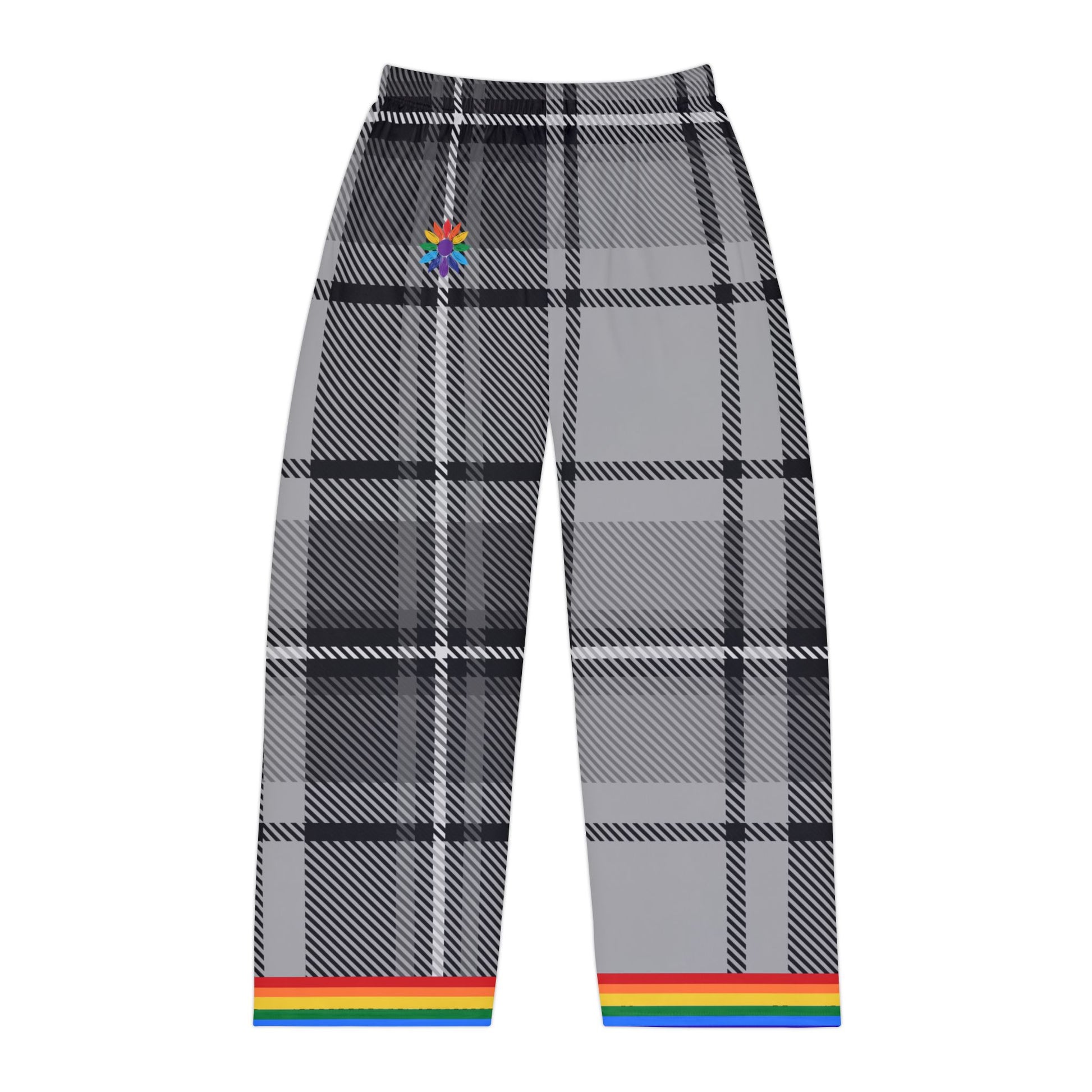 A photo of gray and black plaid pants with a rainbow trim at the cuffs. The pants feature a subtle rainbow-pedaled flower detail near the waistband. The background is plain white.