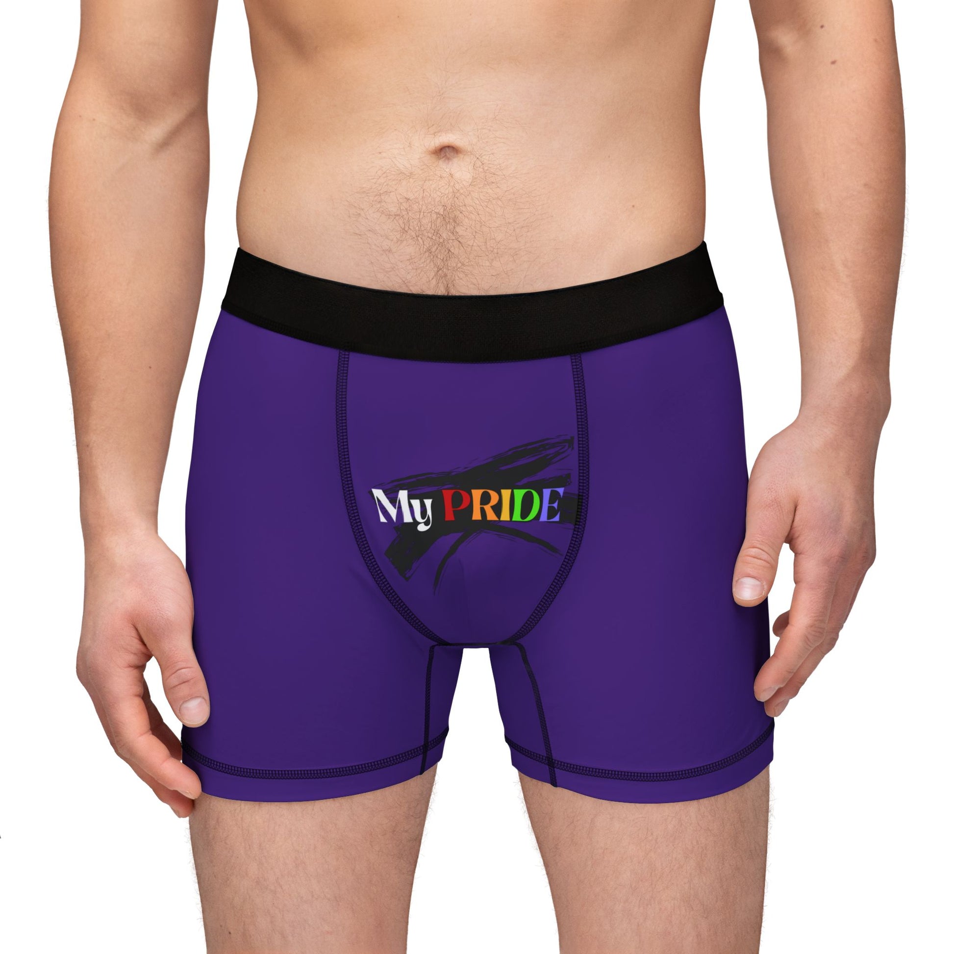A person wearing purple boxer briefs with a black waistband, proudly showcasing My PRIDE in colorful letters on the front and and JOY on the back. This vibrant design celebrates the worldwide PRIDE and spirit of the LGBTQ community.