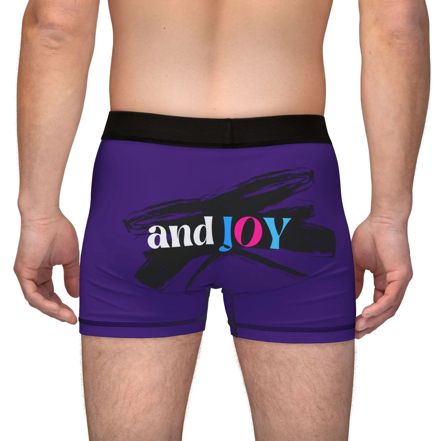 A person wearing purple boxer briefs with a black waistband, proudly showcasing My PRIDE in colorful letters on the front and and JOY on the back. This vibrant design celebrates the worldwide PRIDE and spirit of the LGBTQ community.