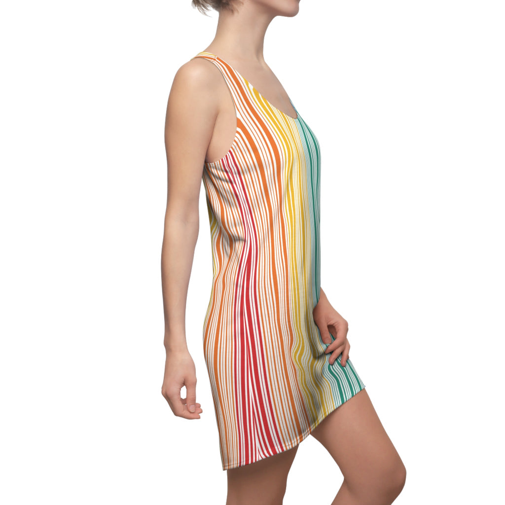 A person is wearing a sleeveless dress with vertical rainbow stripes, celebrating the vibrant spectrum from red to blue. With a plain white backdrop, this outfit is a bold nod to Worldwide PRIDE and the unity of the LGBTQ community.