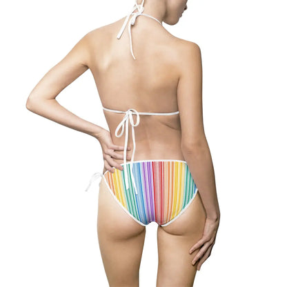 Rear view of a person wearing the vibrant Colorful Floral Bikini Swimsuit for Women, featuring a rainbow-striped bikini bottom and white spaghetti-strap top tied at the neck and back. The minimalistic white background highlights the lively hues of this summer beachwear collection.