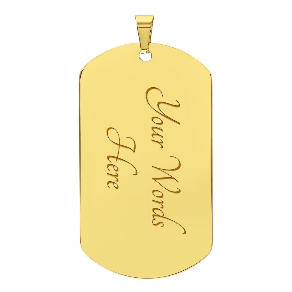 The back of a gold metal dog tag pendant. This side is customizable with your engraved name. The front image celebtates the LGBTQ community.