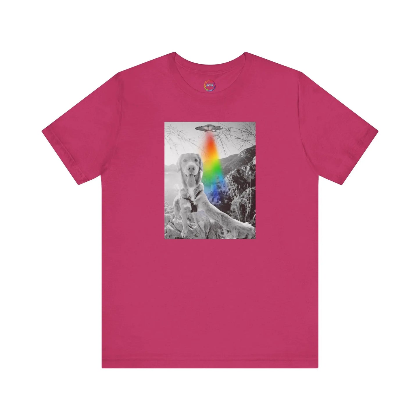 Pink t-shirt with a graphic of a UFO, a dog and a rainbow on a white background