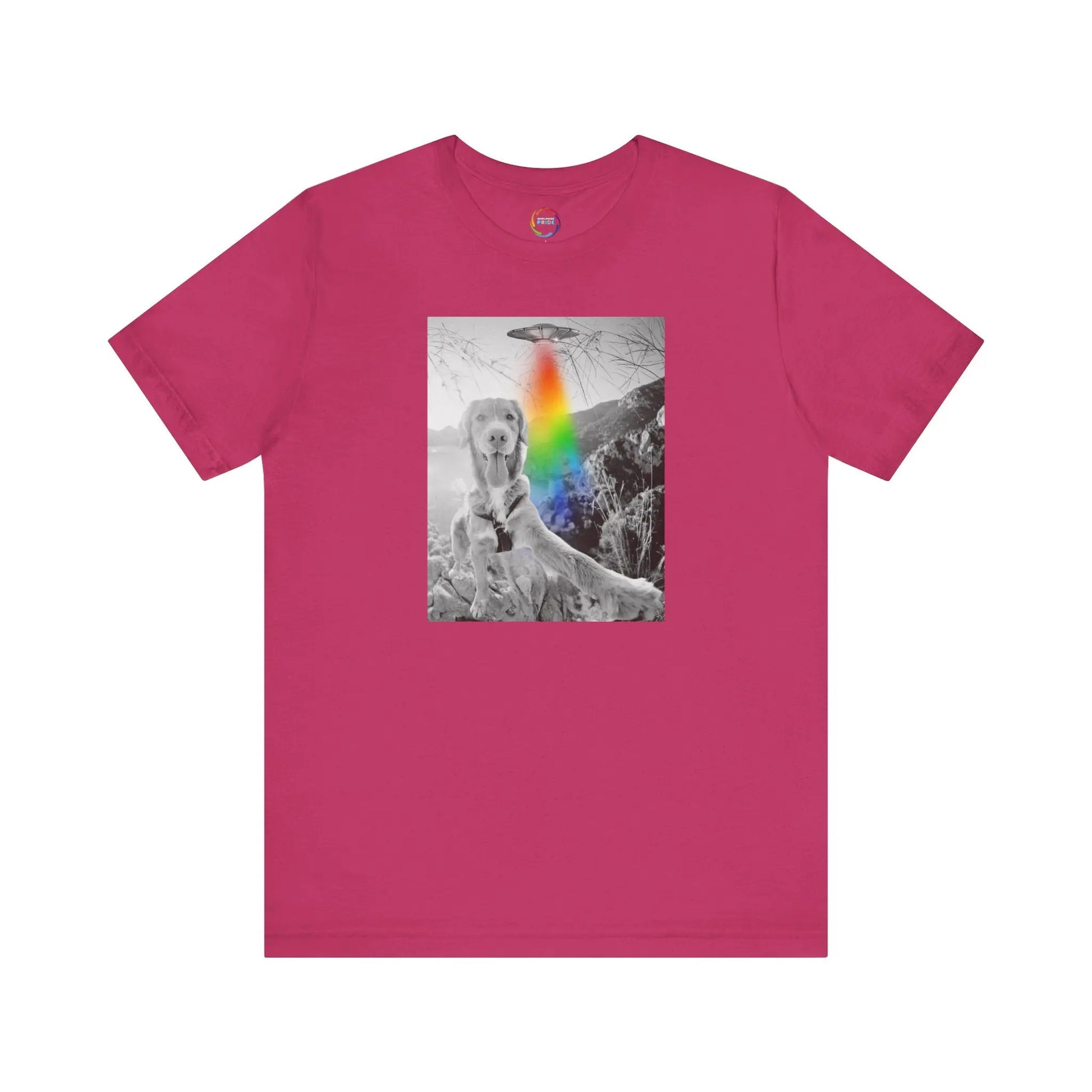 Pink t-shirt with a graphic of a UFO, a dog and a rainbow on a white background