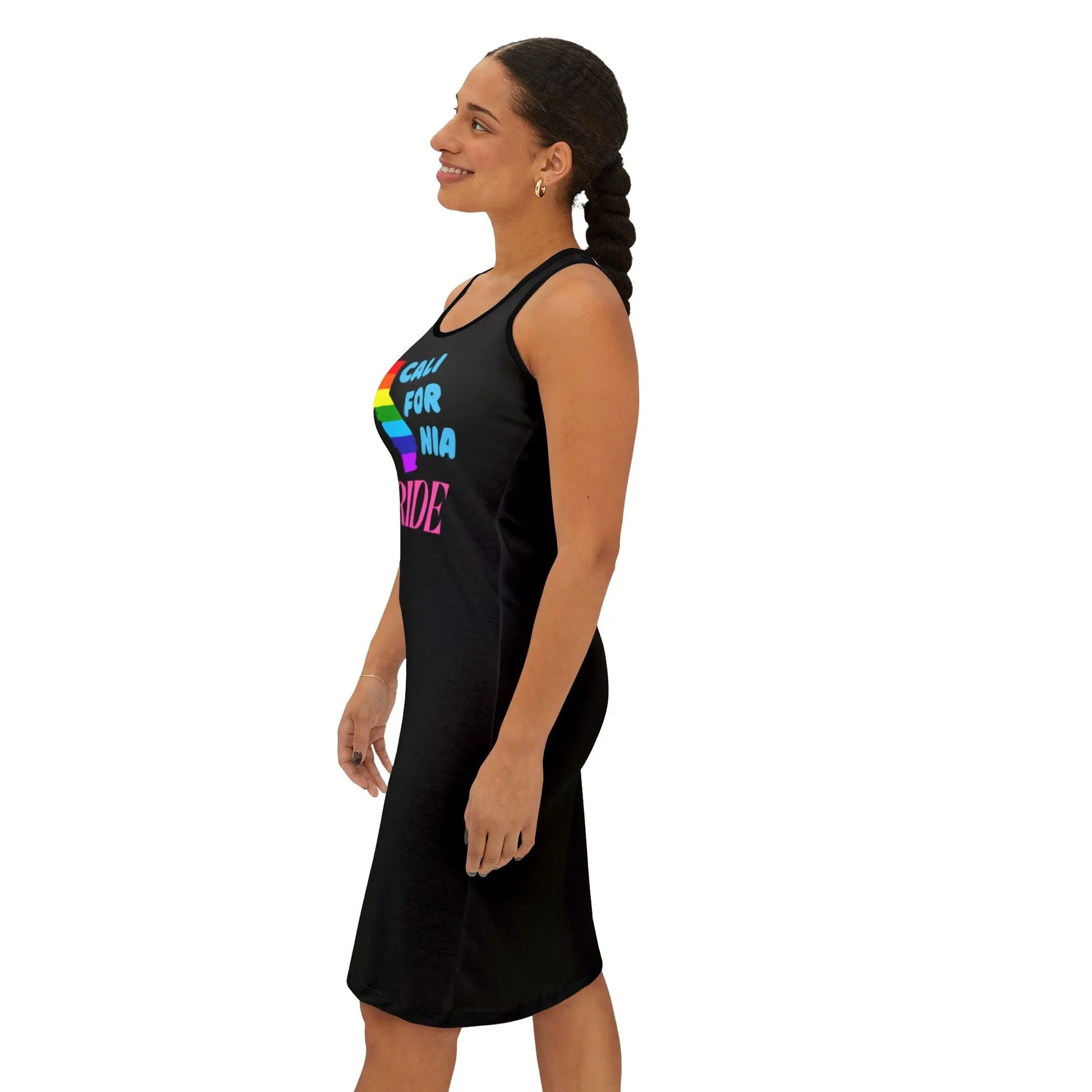Side view of a woman smiling and wearing a black sleeveless dress with 'CALIFORNIA PRIDE' text in rainbow colors on the front.