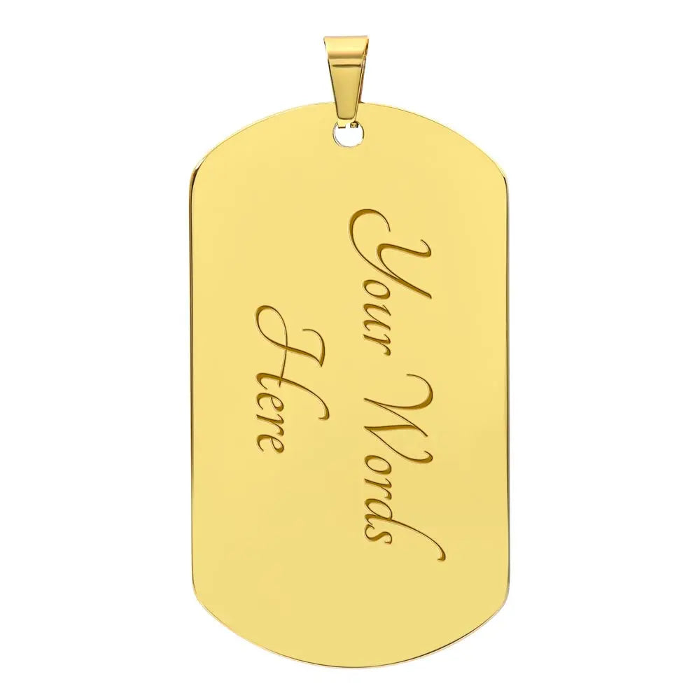 A gold personalized dog tag