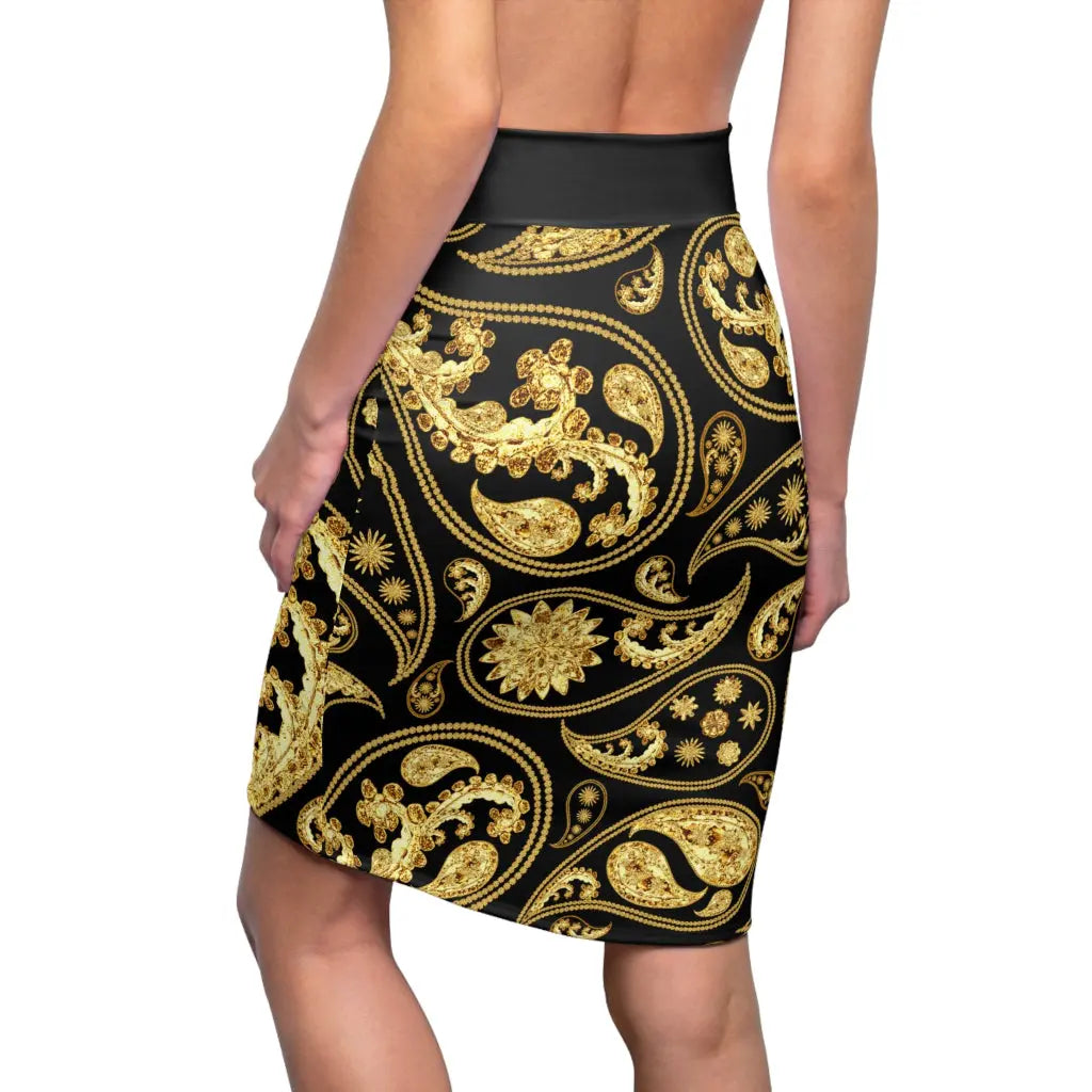 Black skirt with gold paisley pattern worn by a model.