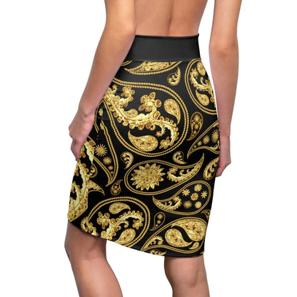 Black skirt with gold paisley pattern worn by a model.