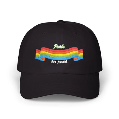A black cap from the Worldwide PRIDE store, featuring a rainbow design and the embroidered pronouns he/him.