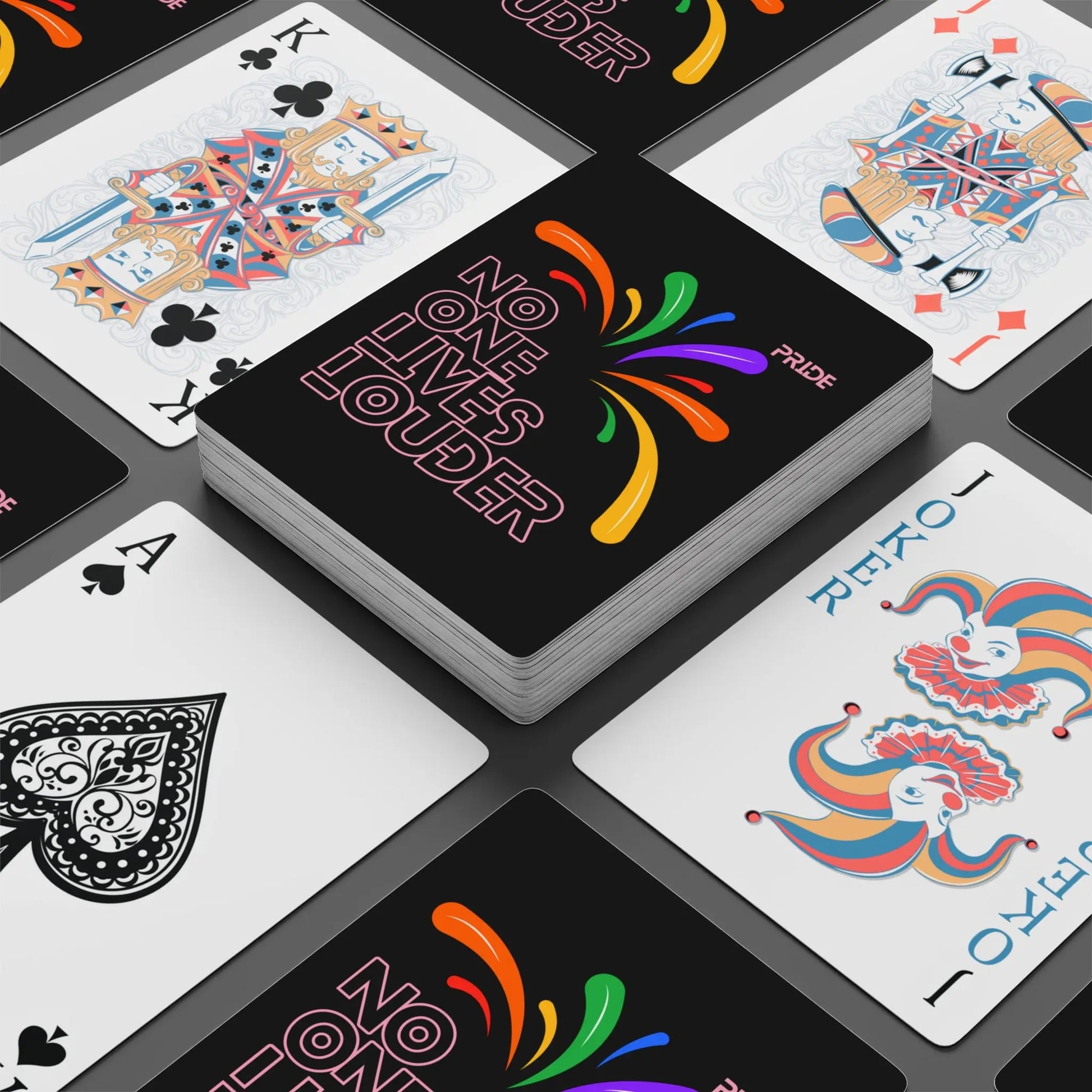Playing cards with colorful designs and text on a black background