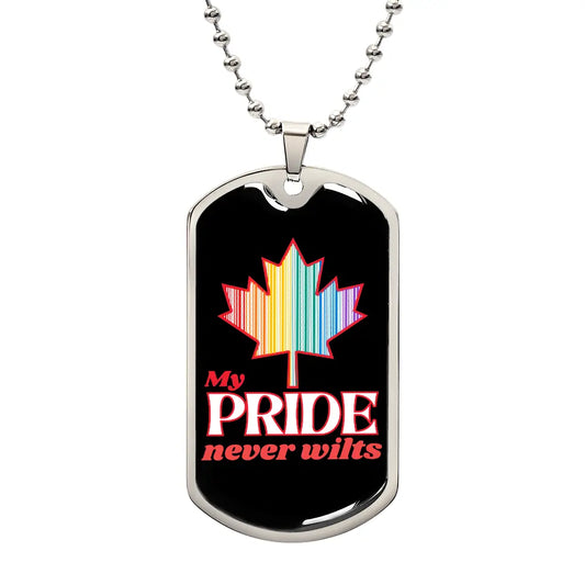 A dog tag necklace with a colorful maple leaf and the text 'My PRIDE never wilts' on a black background.