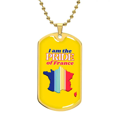 A dog tag necklace with a bright yellow background featuring a colorful map of France and the text 'I am the PRIDE of France'.