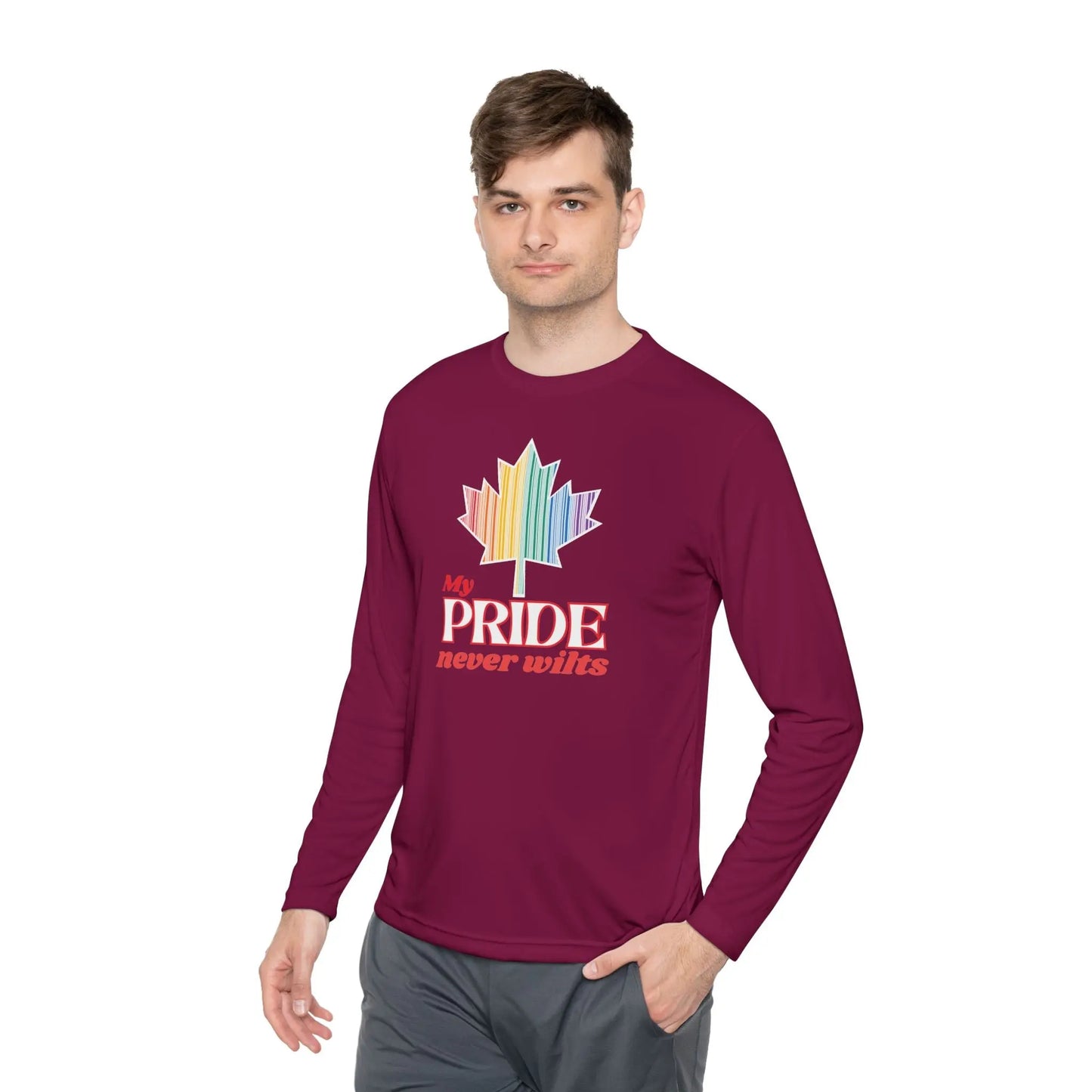 A person wearing a long sleeve maroon t-shirt with a colorful graphic that reads 'My PRIDE never wilts'.