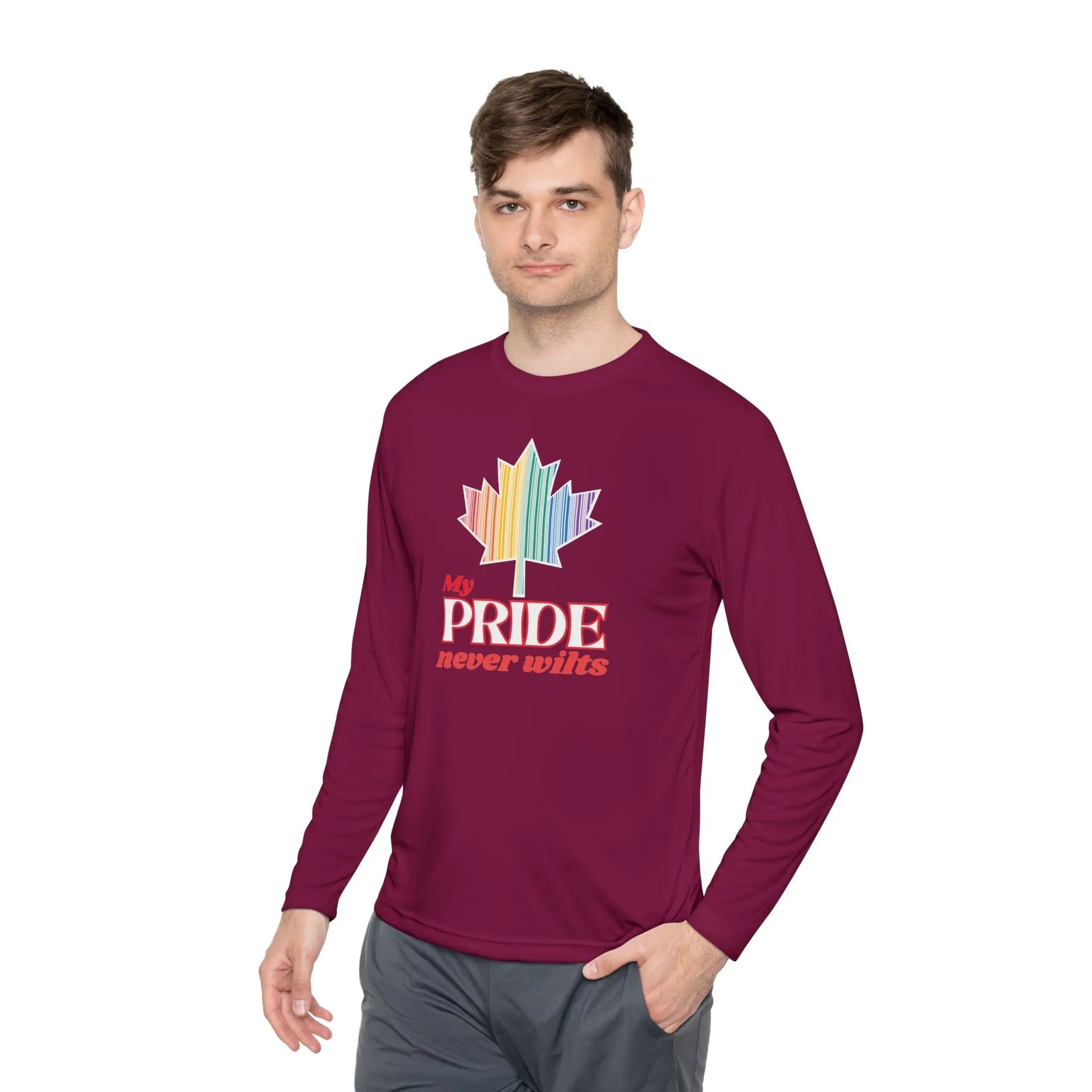 A person wearing a long sleeve maroon t-shirt with a colorful graphic that reads 'My PRIDE never wilts'.