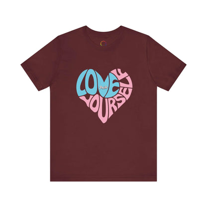 Maroon t-shirt with "Love Yourself" written in the colors that represent the transgender community.