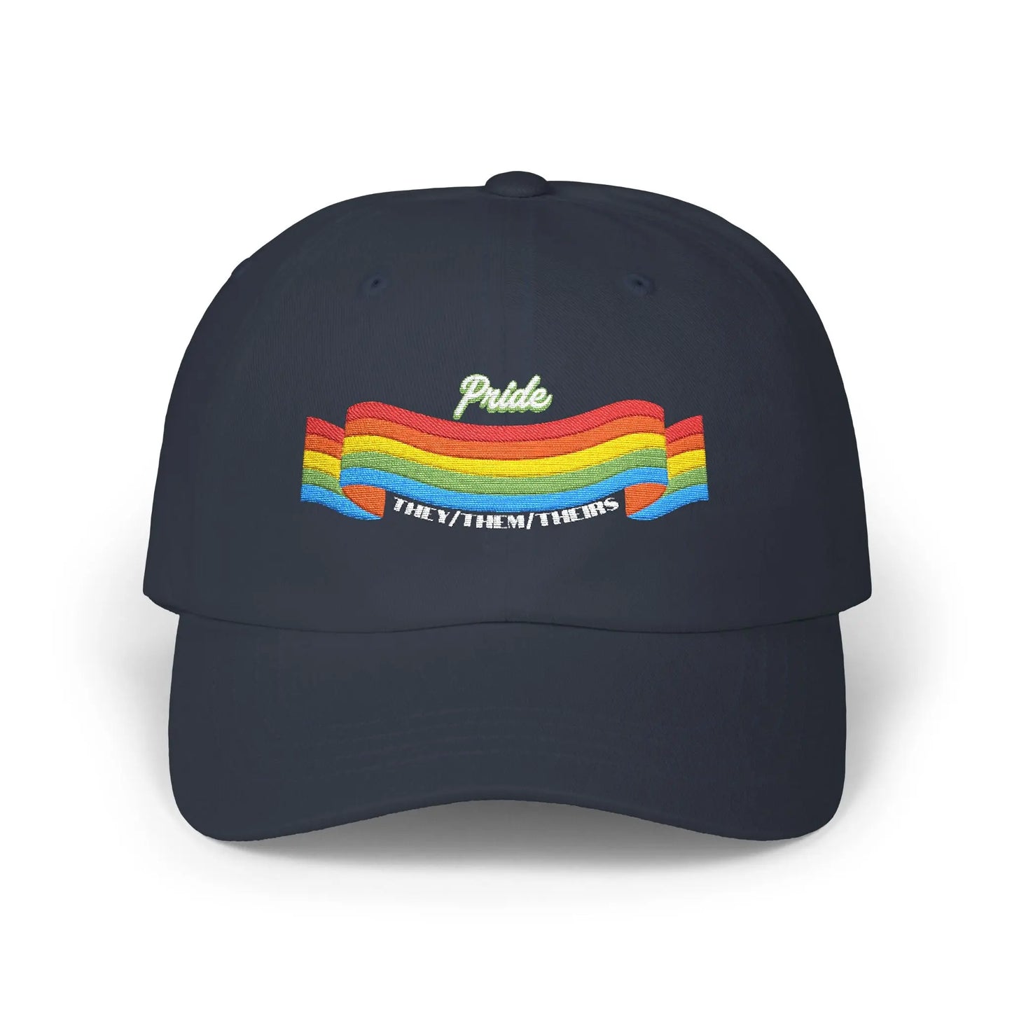 A navy blue cap from the Worldwide PRIDE store, featuring a rainbow design and the embroidered pronouns they/them/theirs.