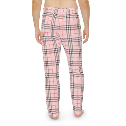 A person wearing a pair of multicolored plaid pajama pants.