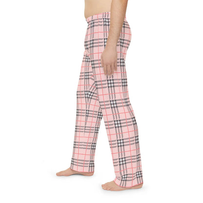 Plaid pajama pants worn by a person on a white background