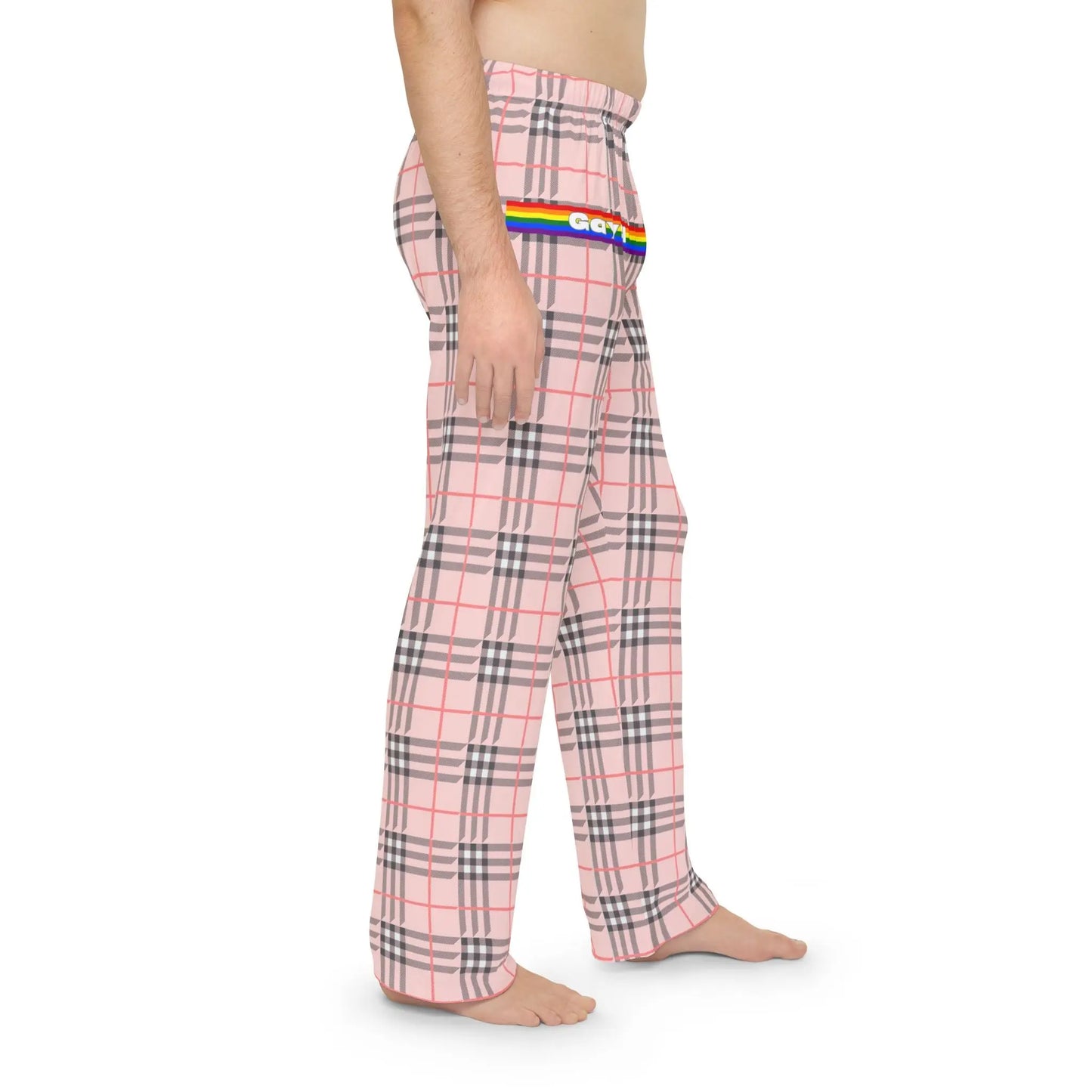 A person wearing a pair of multicolored plaid pajama pants with 'Gay AF' text on the right leg.