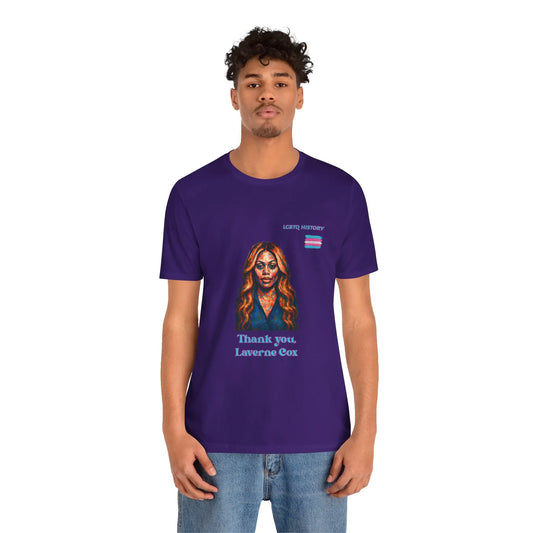 Person wearing a purple t-shirt with a graphic of Laverne Cox and text on a white background