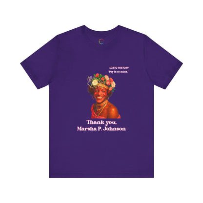 Purple t-shirt with a graphic of Marsha P. Johnson with flowers in her hair and text on a white background