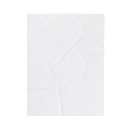 Back of white blanket on white background.