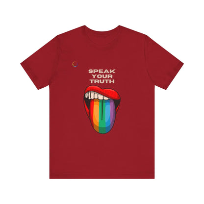 A red tee with a colorful graphic of a rainbow tongue with text that says 'Speak Your Truth' on a white background.
