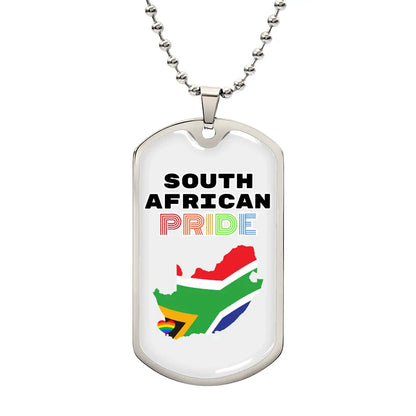 A dog tag necklace with 'SOUTH AFRICAN PRIDE' written on it and the colors of the South African flag in the background.