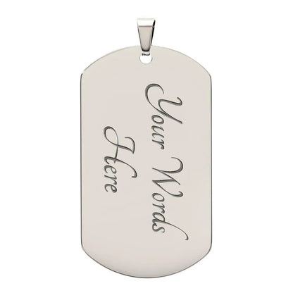 A silver personalized engraved dog tag