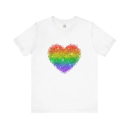 A white t-shirt with a glitter rainbow heart design.