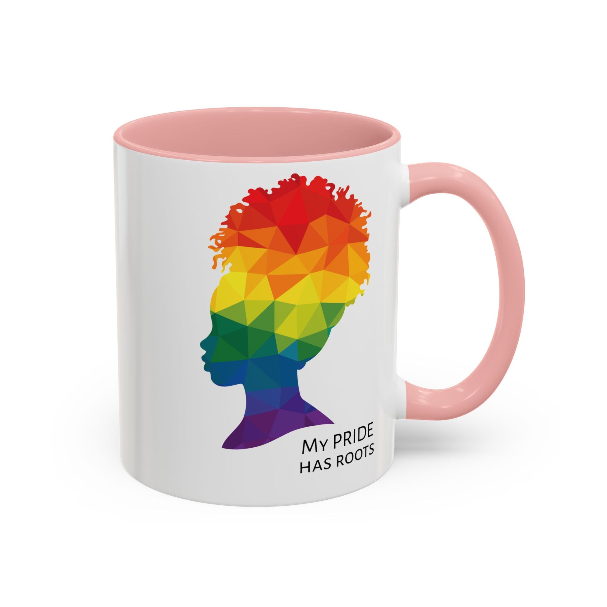 A white mug with a pink handle and rim, featuring a vibrant geometric silhouette of a womans head with a rainbow afro and MY PRIDE HAS ROOTS below—perfect for the LGBTQ community from The Worldwide PRIDE Store.